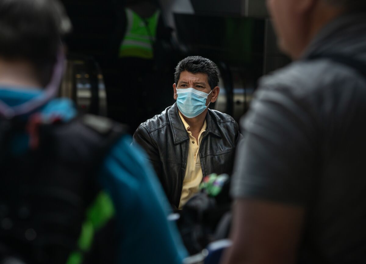 A man wearing a medical face mask