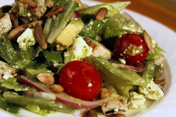 Rich avocado dressing flavors this colorful salad. Recipe: Bluewater Grill's chopped chicken salad