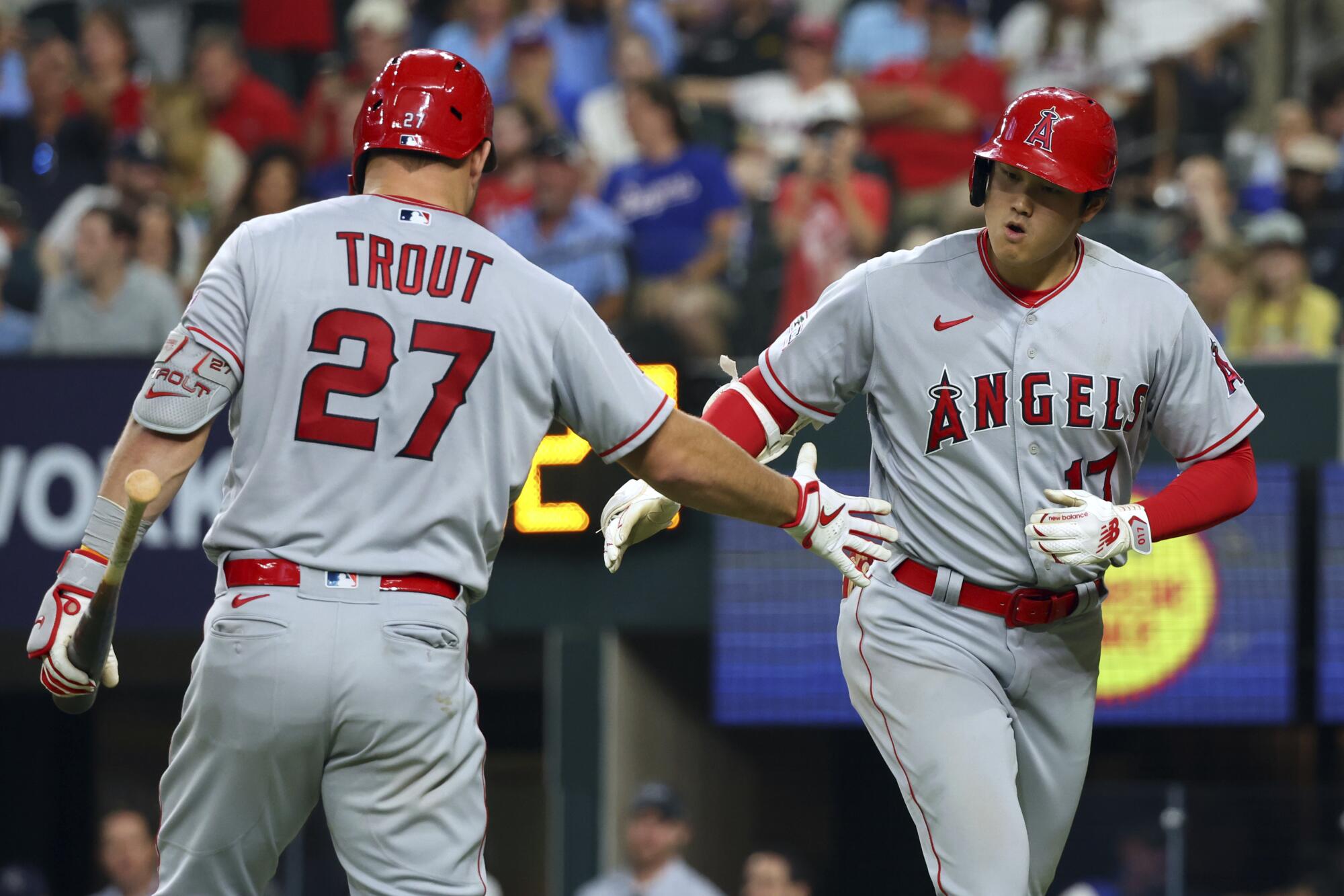 Angels say they won't trade Shohei Ohtani. He celebrates with a 1