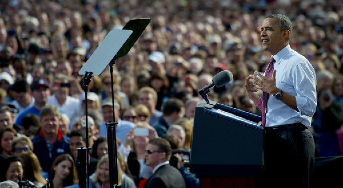 President Barack Obama addresses a crowd of supporters during a rally today in Nashua, New Hampshire.