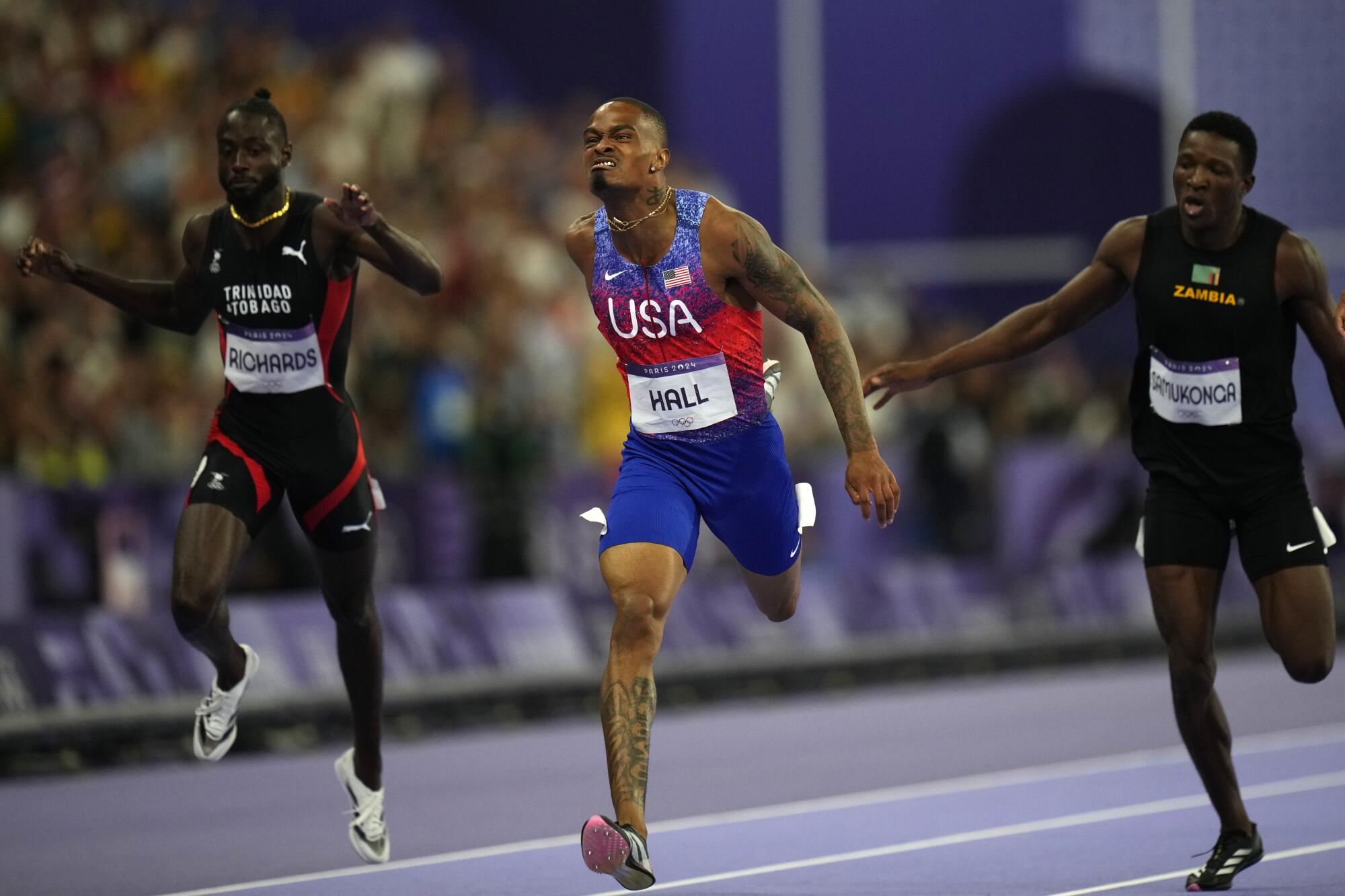 American Quincy Hall wins the men's 400-meter final at the 2024 Summer Olympics Wednesday in Saint-Denis, France. 