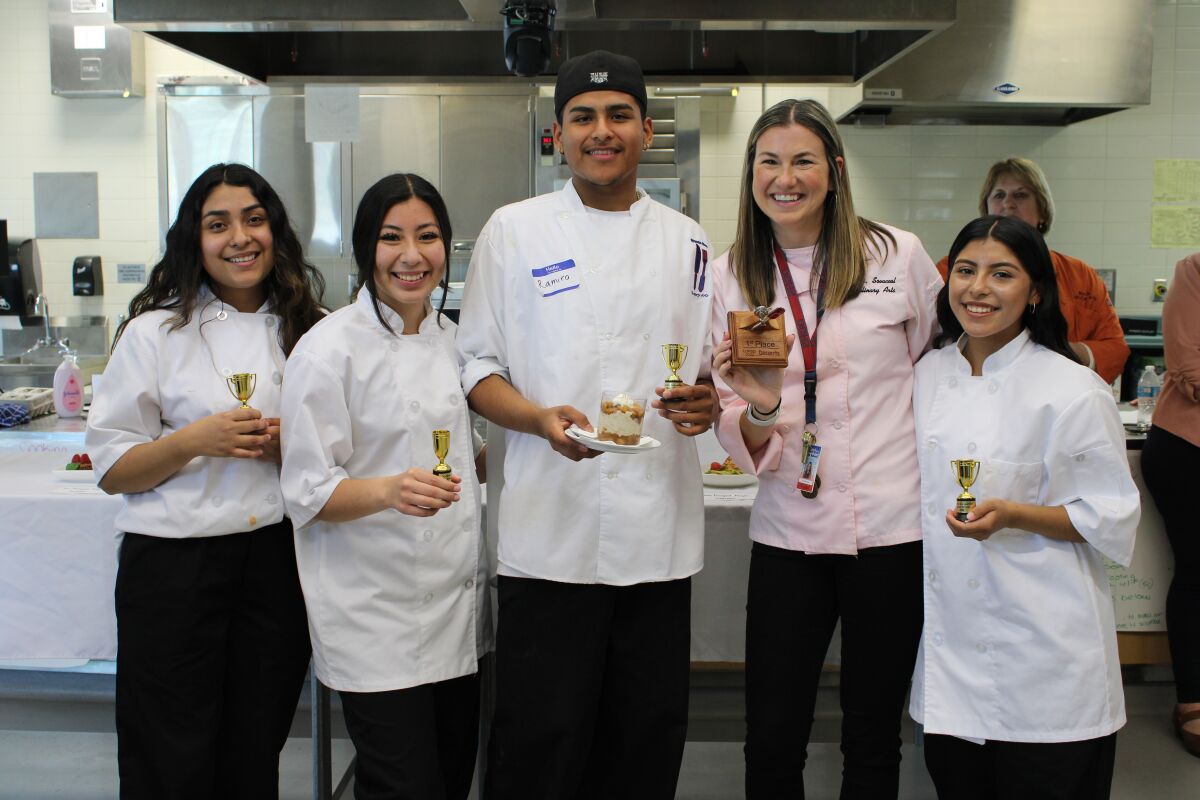 OGHS team Ramiro Gonzalez Torres, Edith Pinzon, Emily Pereda, Emily Sanchez with teacher Kristi Sovacool won best dessert.