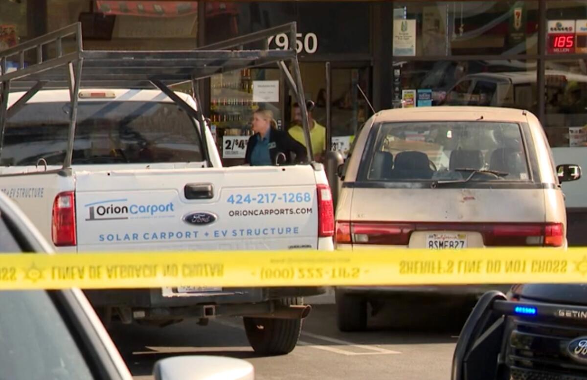 Los Angeles Sheriff's Department personnel on the scene of a deadly fight 