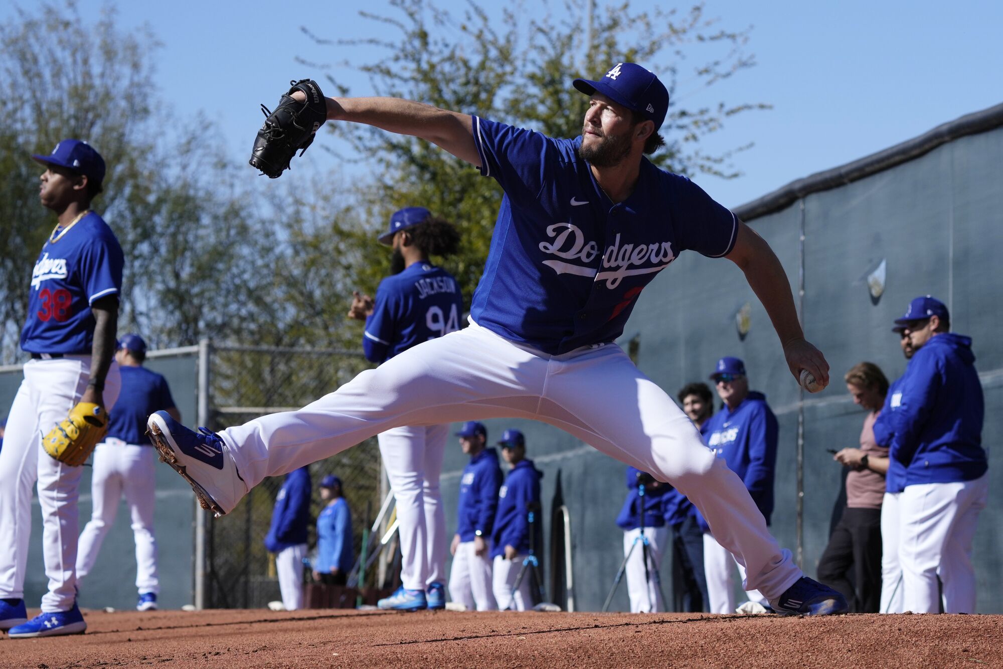 Clayton Kershaw takes part in a spring training workout session.