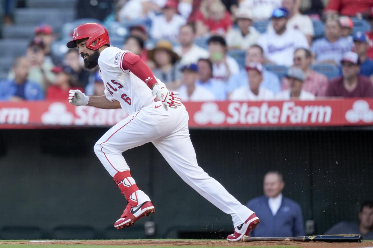 Anthony Rendon hits into a ground out during the first inning of the Angels' 9-4 loss to the Texas Rangers.