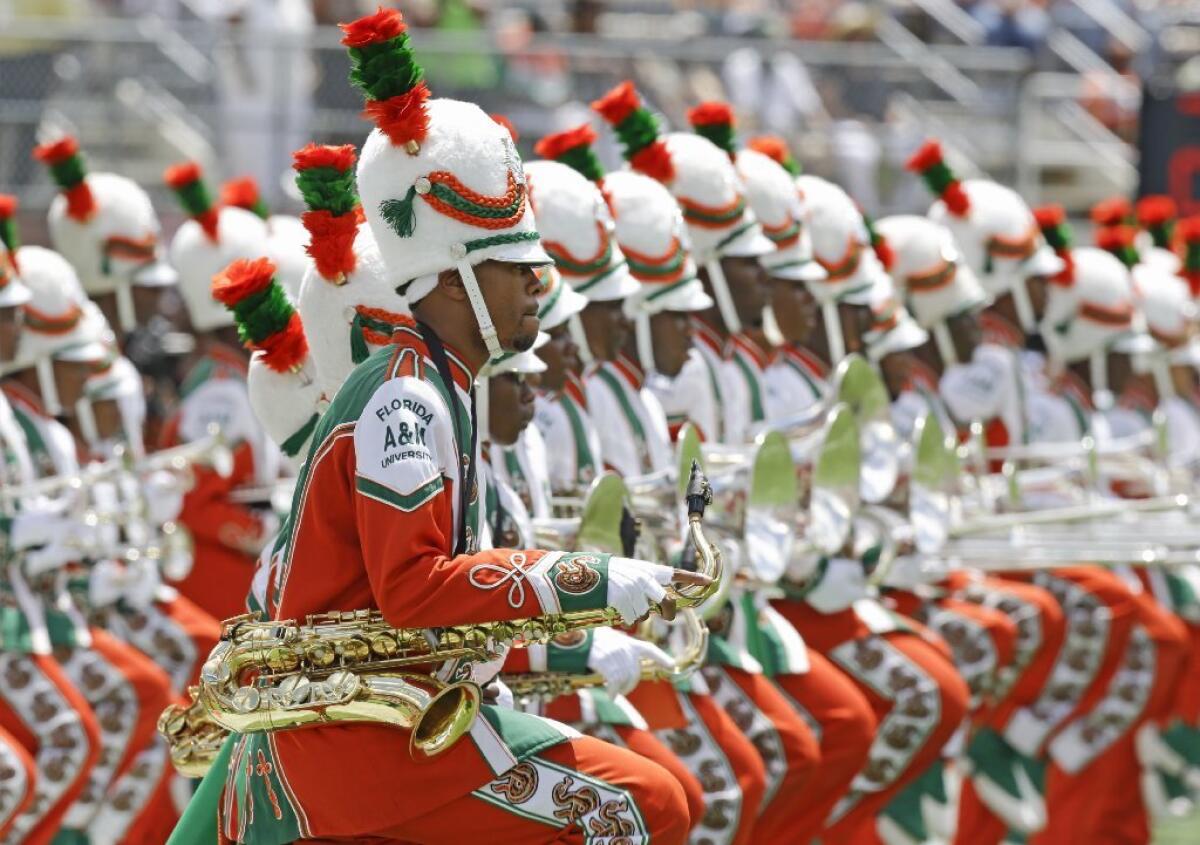 The Florida A&M University band performs in Orlando, Fla., during the school's season-opening football game against Mississippi Valley State. It was the band's first appearance in a football stadium in nearly 22 months after the 2011 hazing death of a drum major.