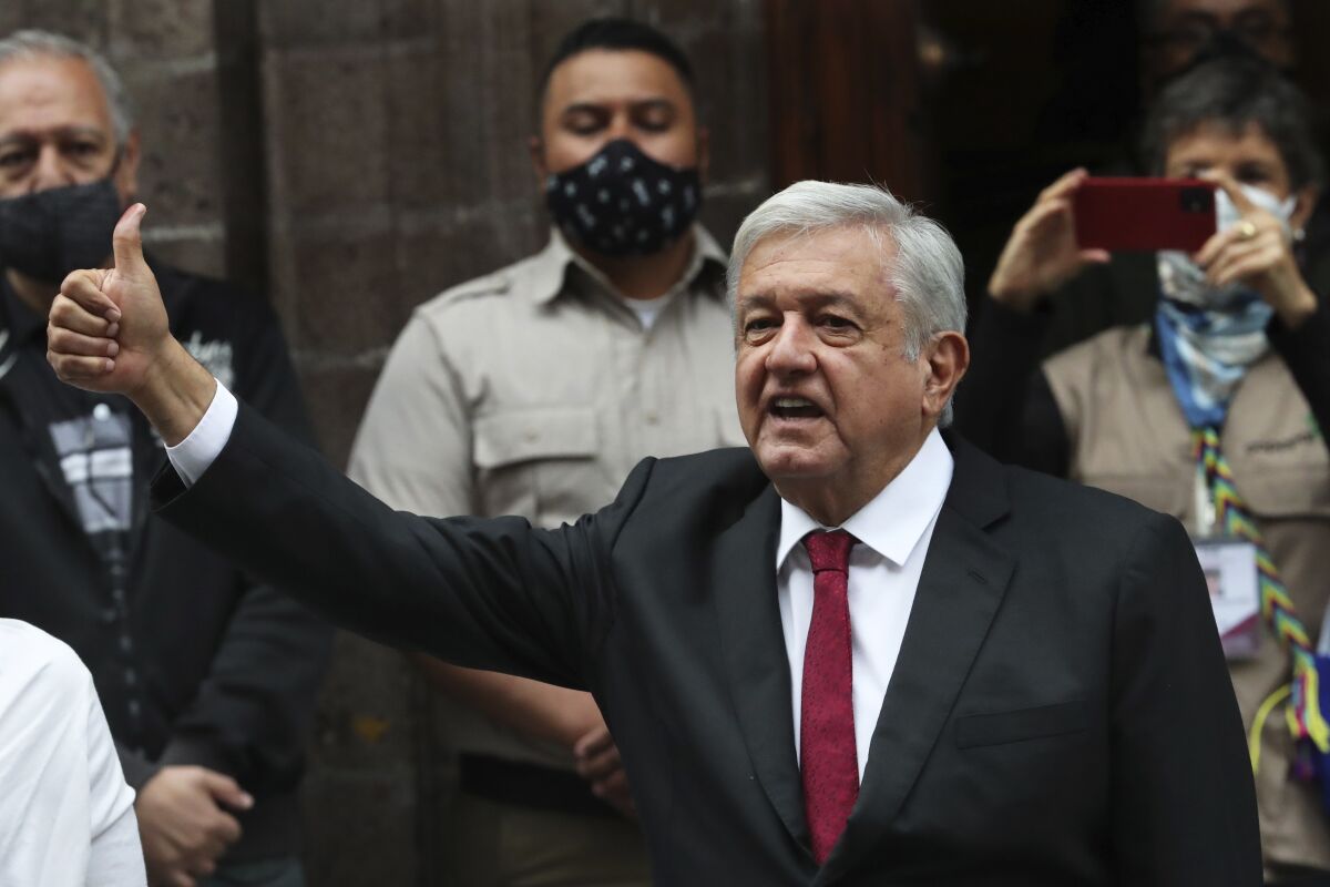 Mexican President Andrés Manuel López Obrador flashing thumbs-up sign