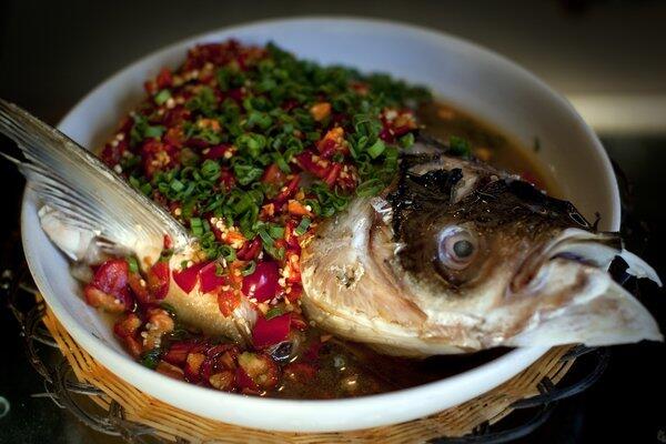 Steamed fish head in a chile-laden broth is favorite at Hunan Mao in Rosemead.