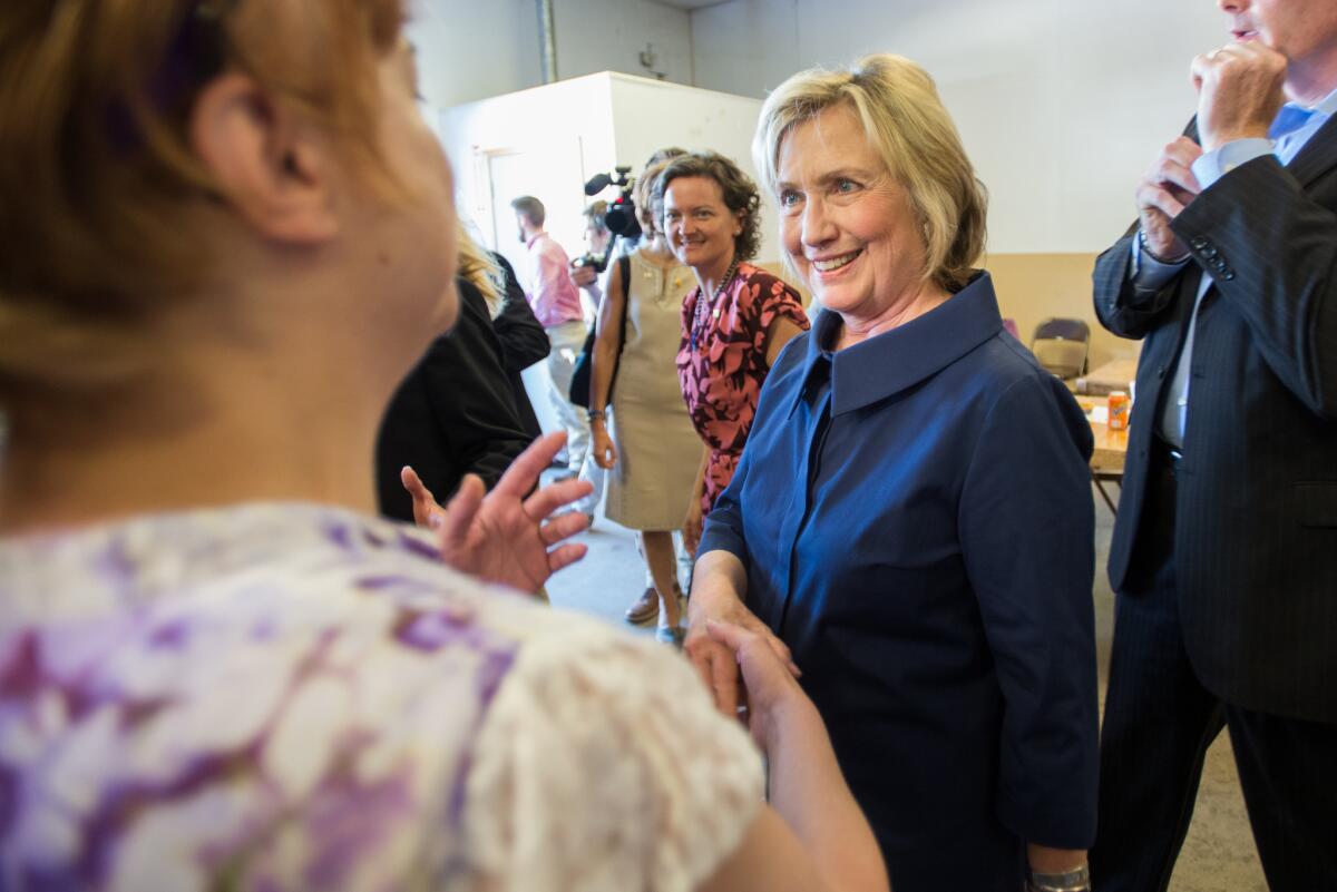 Democratic presidential hopeful Hillary Rodham Clinton meets with supporters at an AFL-CIO Labor Day picnic in Cedar Rapids, Iowa.