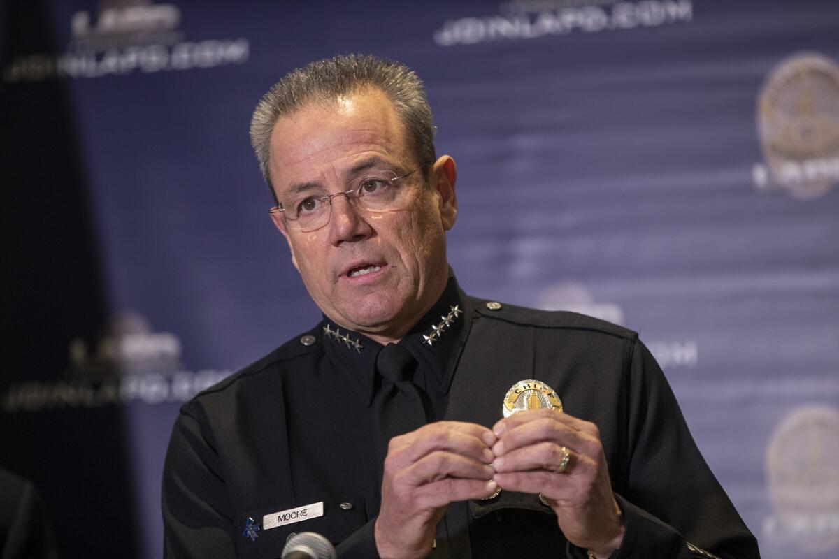 Los Angeles Police Chief Michel Moore speaks at a news conference