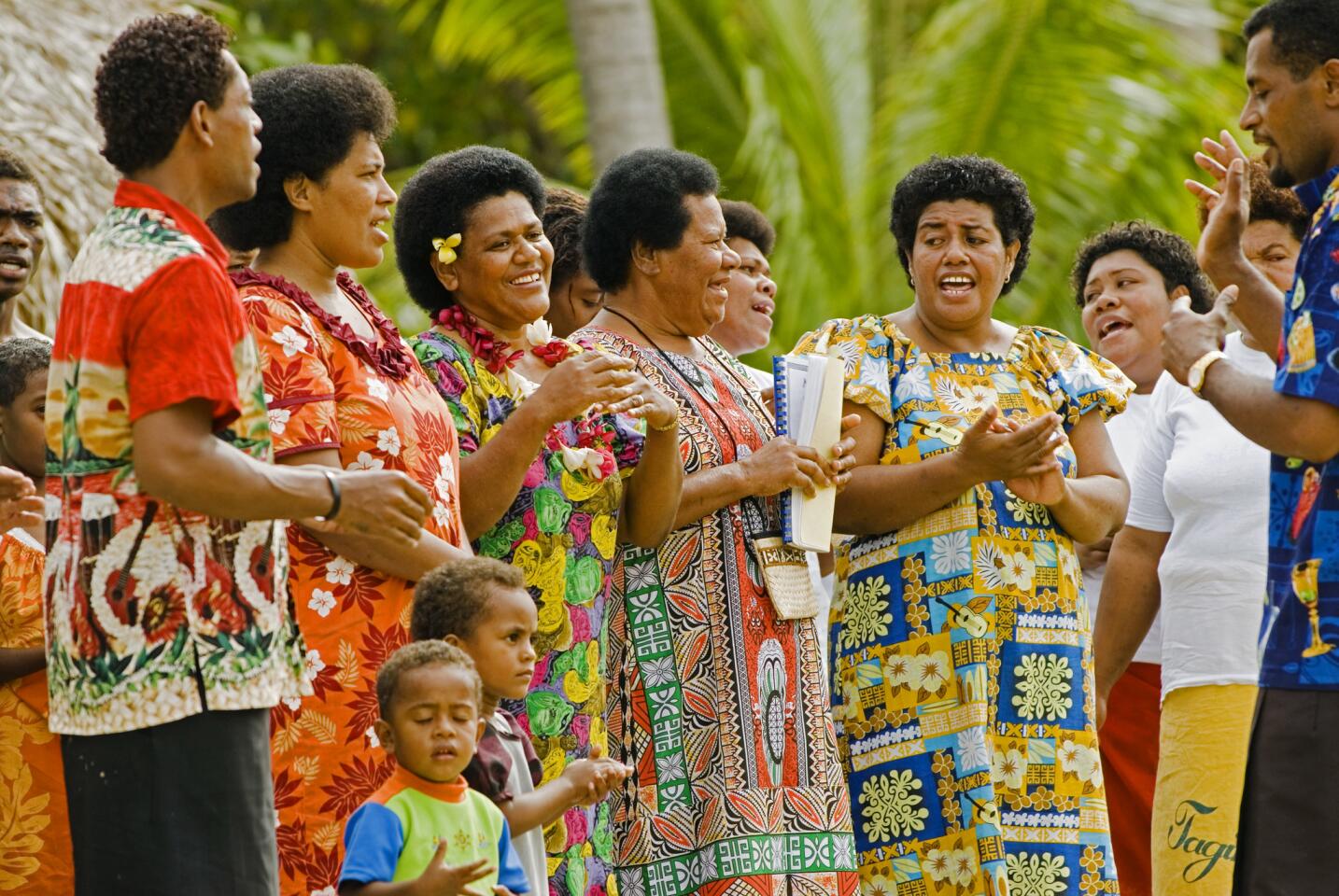 Dravuni women singing a welcome to Cruise ship passengers on their arrival to Kadavu Island in Fiji.