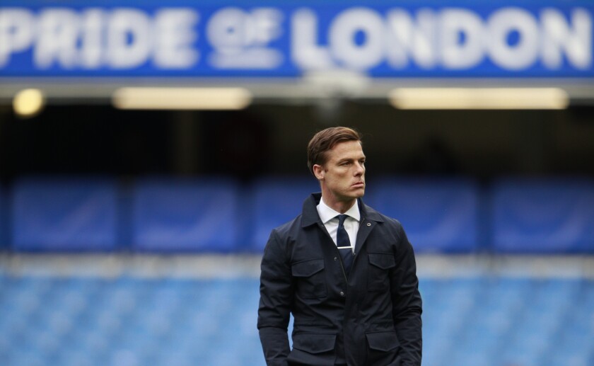 Fulham's manager Scott Parker looks out during warm up before the English Premier League soccer match between Chelsea and Fulham at Stamford Bridge Stadium in London, Saturday, May 1, 2021. (AP Photo/Ian Walton, Pool)