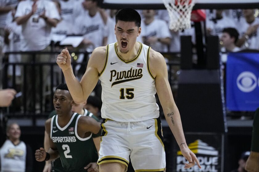 Purdue center Zach Edey (15) celebrates a basket against Michigan State during the first half of an NCAA college basketball game in West Lafayette, Ind., Sunday, Jan. 29, 2023. (AP Photo/Michael Conroy)