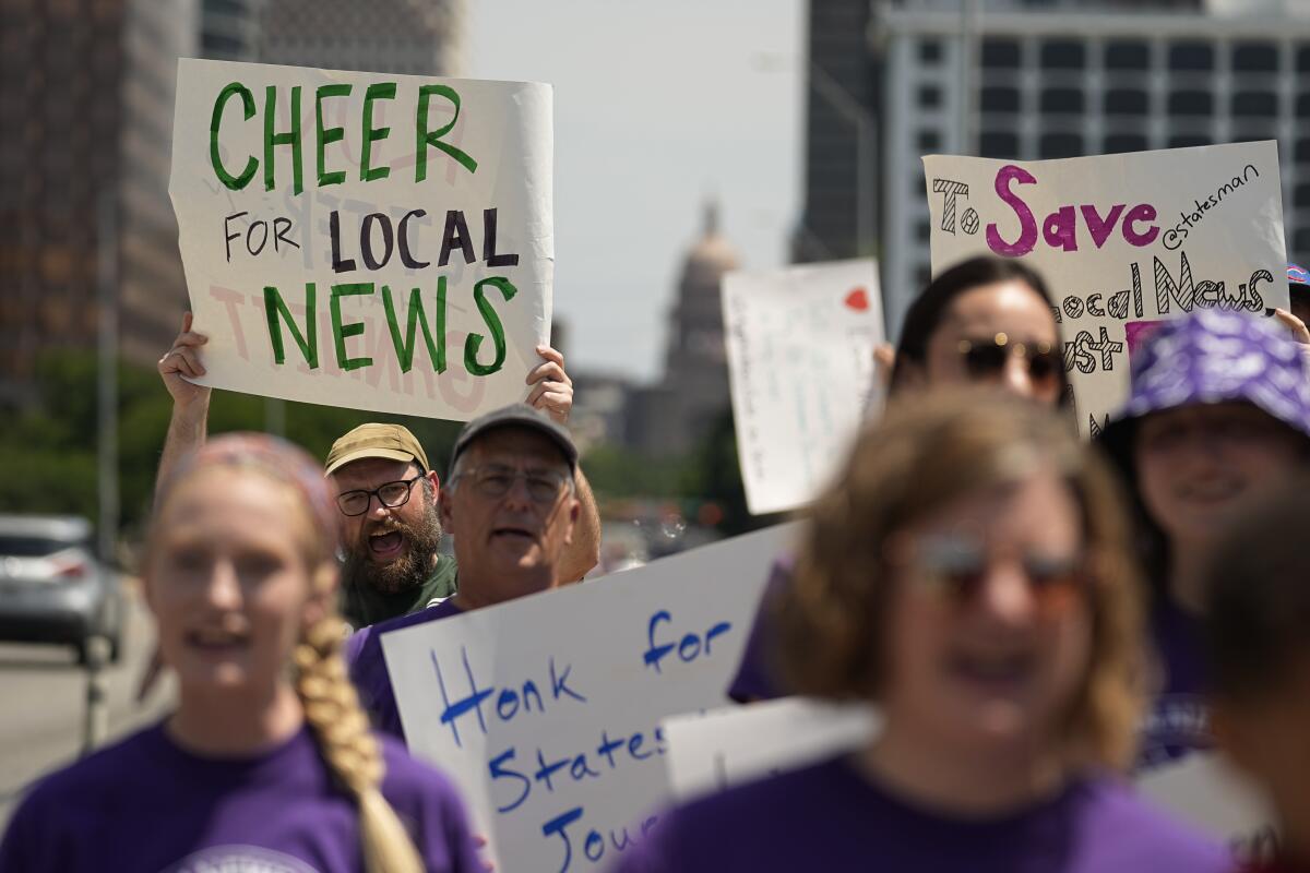 Editorial members of the Austin American-Statesman's Austin NewsGuild picket.