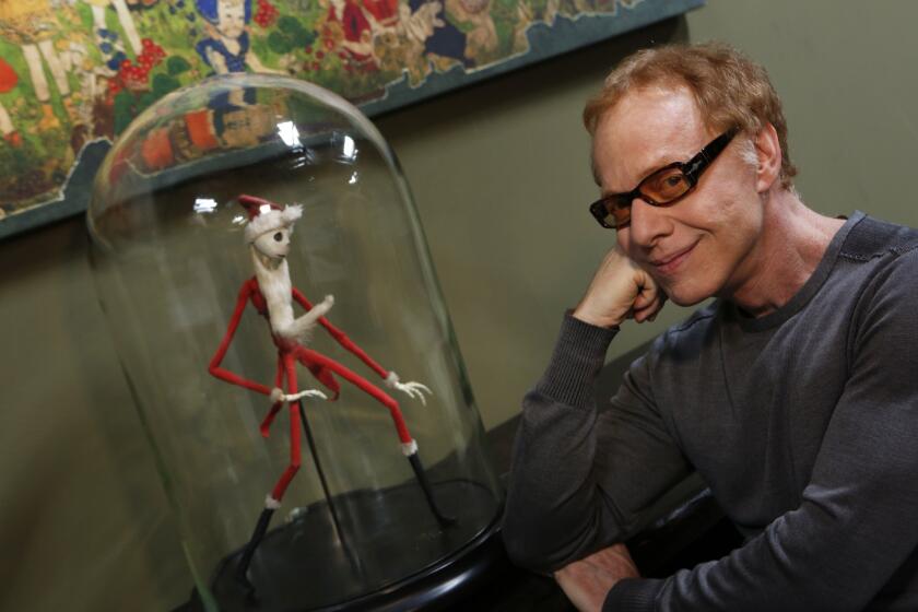 Composer Danny Elfman at his studio in Los Angeles on Sept. 16, 2013. The character Jack from "A Nightmare Before Christmas" is at left.