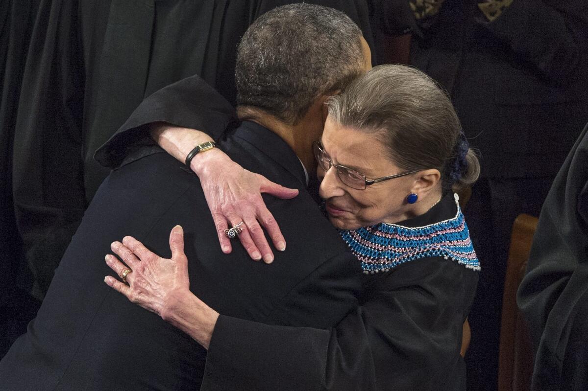 The late Supreme Court Justice Ruth Bader Ginsburg embraces President Obama after his 2014 State of the Union.