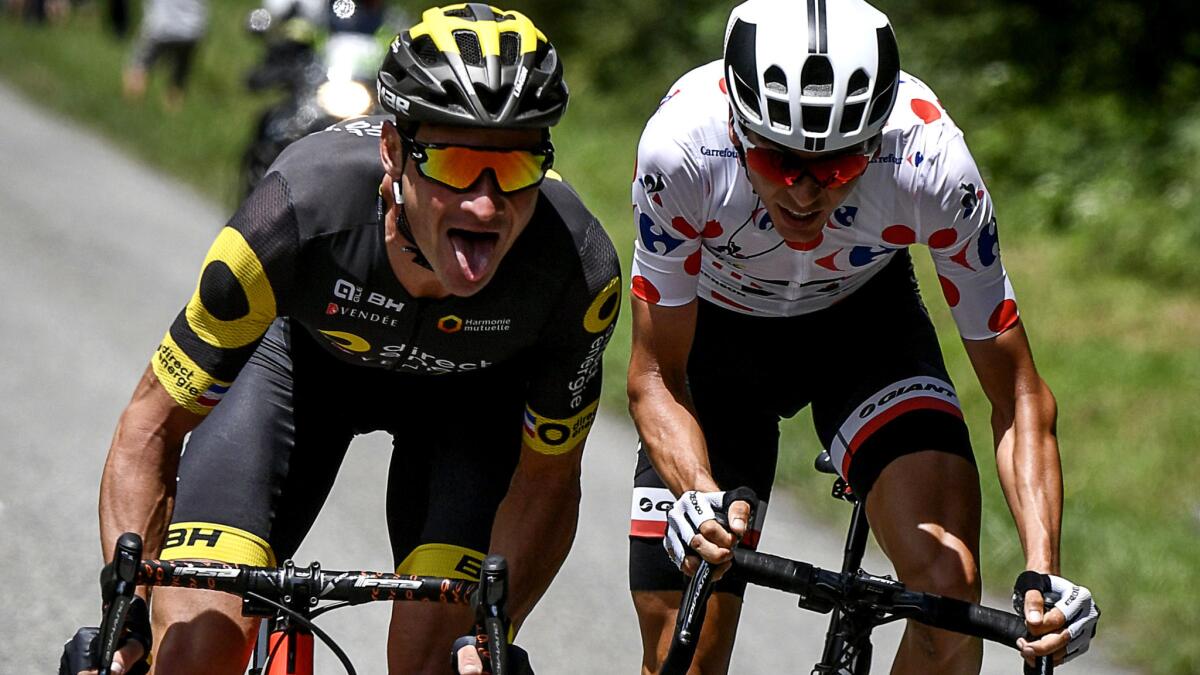 Thomas Voeckler, left, and Warren Barguil begin a breakaway during Stage 13 of the Tour de France on Friday.