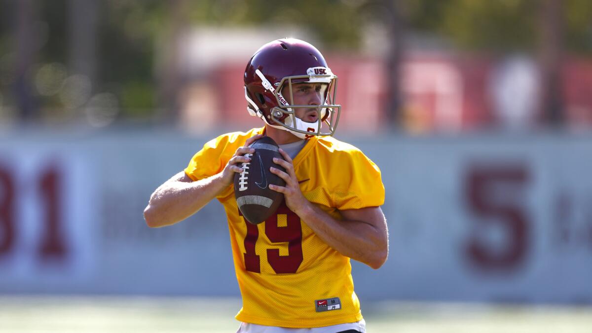 Trojans quarterback Matt Fink completed the only touchdown pass in camp on Tuesday.