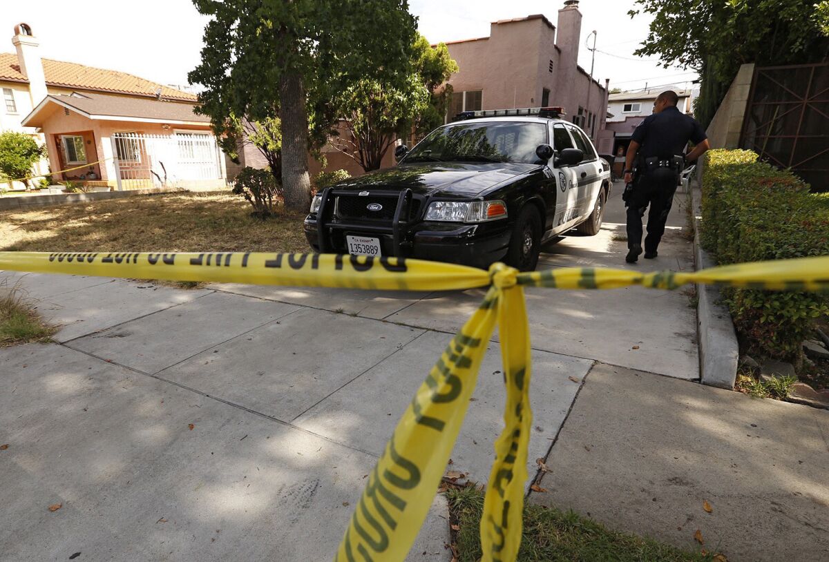 An investigation at a Glendale home in the 600 block of Alexander Street on June 29, where the bodies of a couple were found the day before.