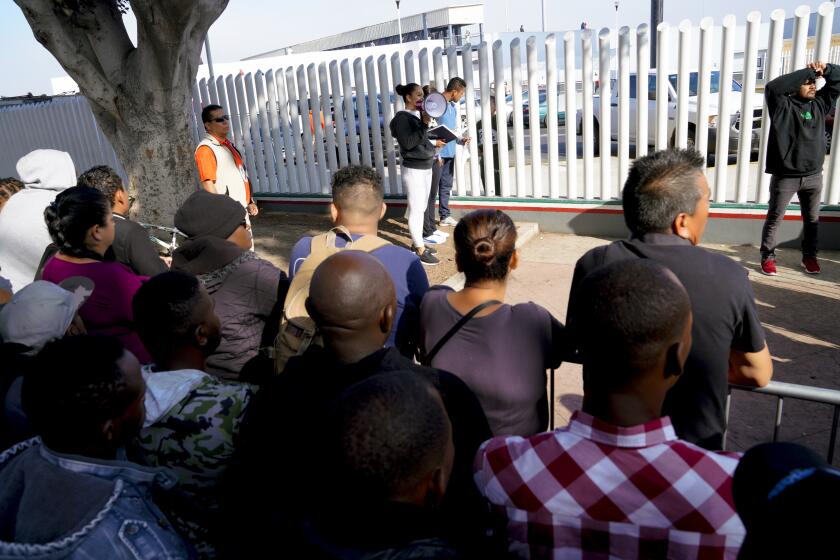 Waiting early Tuesday morning El Chaparral in Tijuana, hundreds wait as a few numbers are called to go to the U.S. border to meet with U.S. immigration officials. Under the new rule, which is set to take effect today on Tuesday, migrants arriving at U.S. territory on the southwest border would be ineligible to apply for asylum if they had failed to file for safe haven in another country en route to the United States.