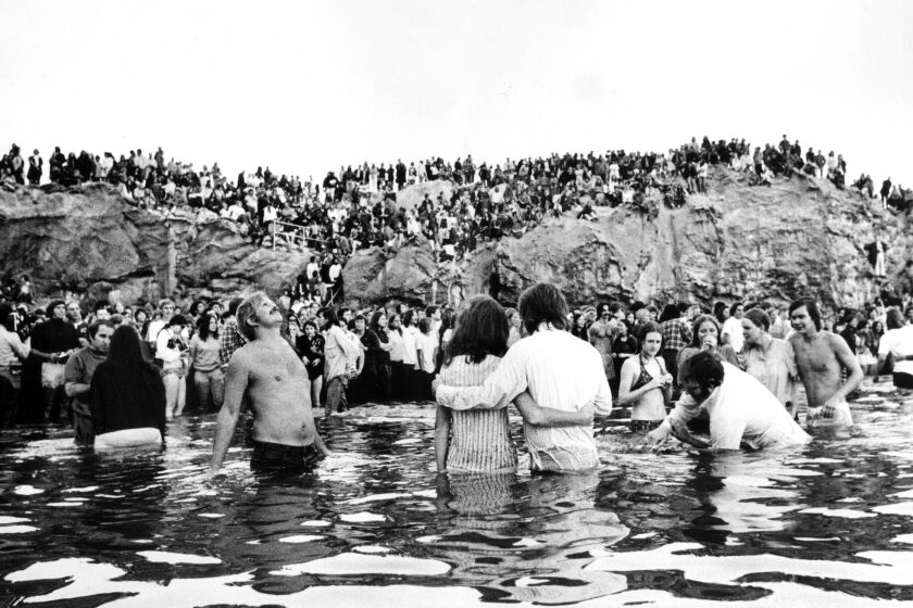 May 5, 1973: Hundreds of Calvary Chapel members line Corona del Mar beach for baptism ceremony.