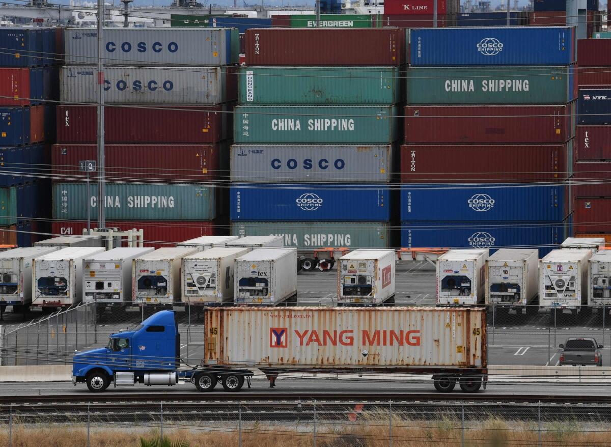 Unloaded containers from Asia are seen at the main port terminal in Long Beach on May 10. 