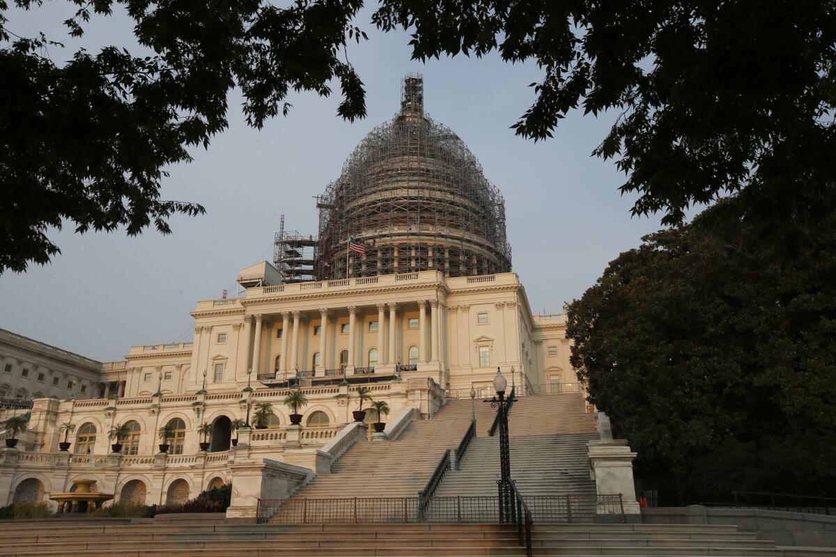 The west front of the U.S. Capitol is seen under repair on Sept. 2 in Washington.
