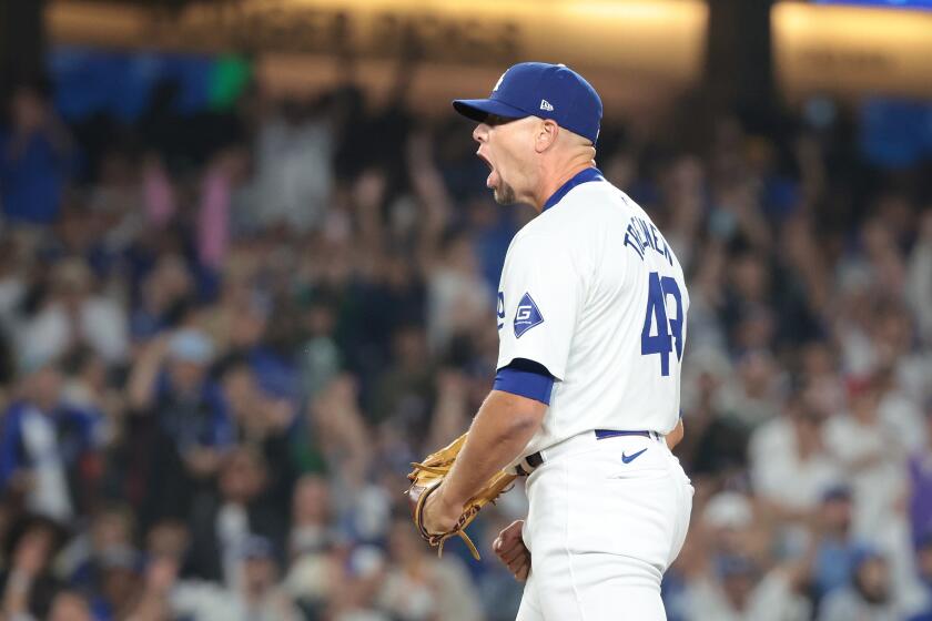 Los Angeles, California August 29, 2024-Dodgers pitcher Blake Treinen celebrates.