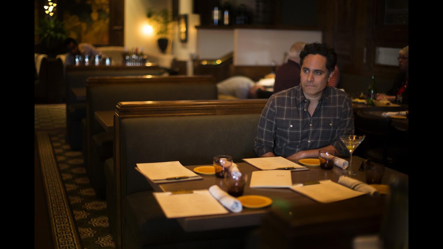 Rajiv Joseph relaxes with a martini as he awaits friends at Kendall's ahead of the opening night of a preview performance for his new play, "Archduke," on April 25 in Los Angeles.