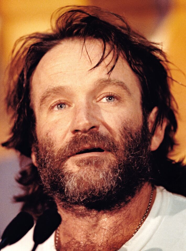 Robin Williams speaks to the media backstage after his performance at the Sam Kinison tribute held at the Celebrity Theatre in Anaheim, Sept. 3, 1992.