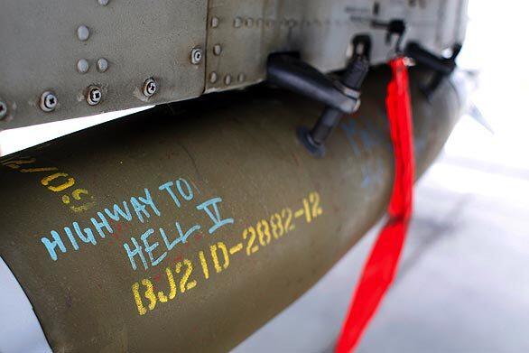 A bomb attached to an A-10 Warthog, a frequent choice for close air support to aid troops in trouble on the ground, bears a message that refers to an old AC/DC song.