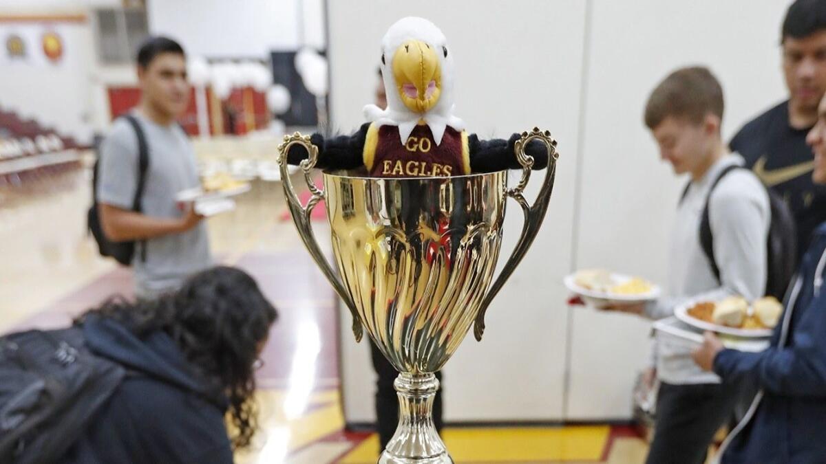 The All-Sports Cup trophy was on display during a luncheon at Estancia High on Wednesday. The trophy is awarded annually to the winner of the rivalry between Estancia and Costa Mesa.