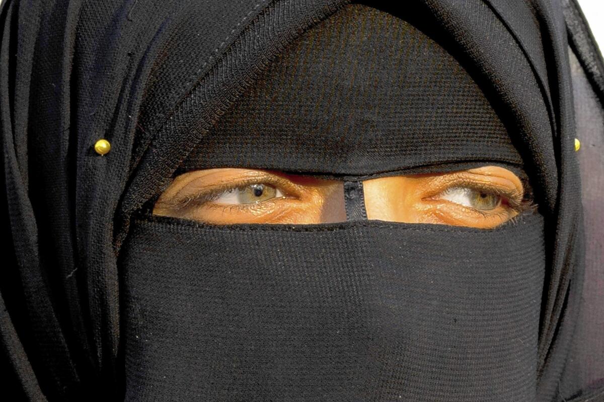 A woman attends a political rally in Cairo last year. Female genital excision has been banned in Egypt since 2008, but the procedure is common, especially away from urban areas.