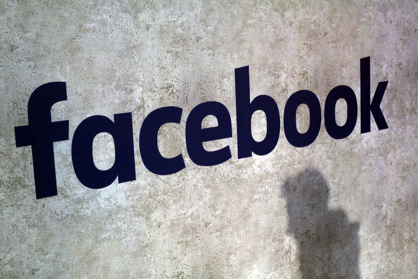 FILE - This Jan. 17, 2017, file photo shows a Facebook logo in Paris. From complaints whistleblower Frances Haugen has filed with the SEC, along with redacted internal documents obtained by The Associated Press, the picture of the mighty Facebook that emerges is of a troubled, internally conflicted company, where data on the harms it causes is abundant, but solutions are halting at best. (AP Photo/Thibault Camus, File)