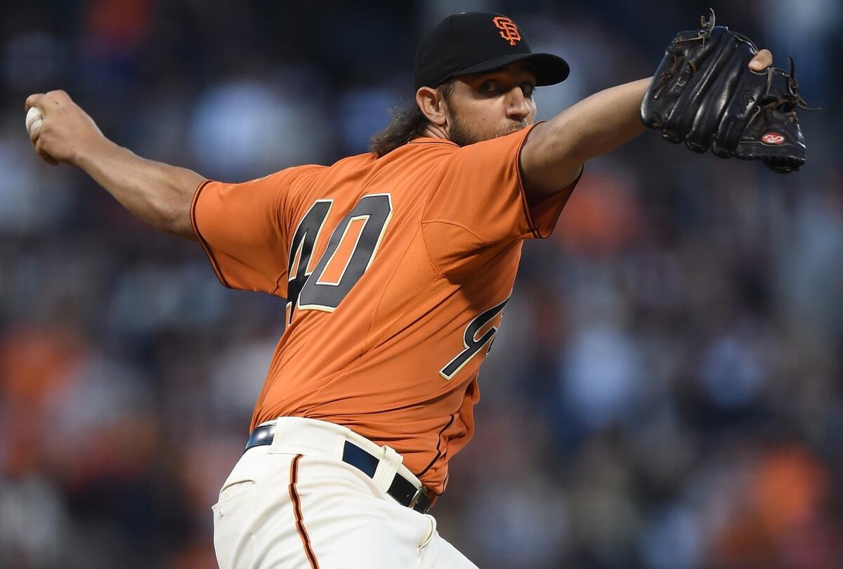 Madison Bumgarner scattered three hits over seven innings while striking out nine Dodger batters on Friday at AT&T Park.