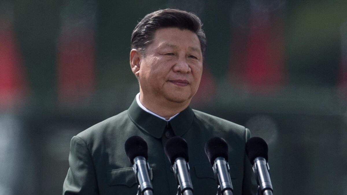 China's President Xi Jinping inspects People's Liberation Army soldiers at a barracks in Hong Kong on June 30.