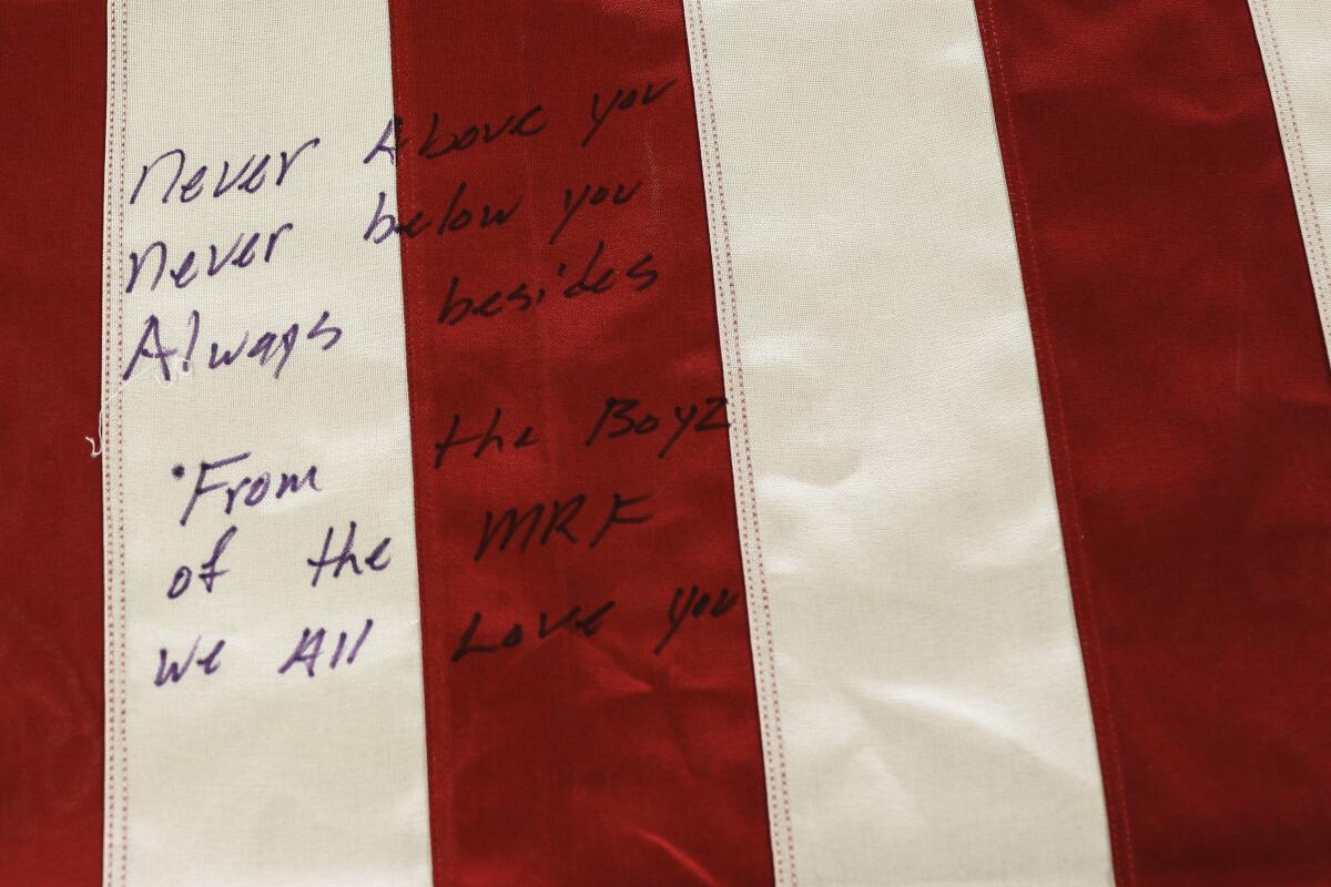 Handwritten message on a U.S. flag