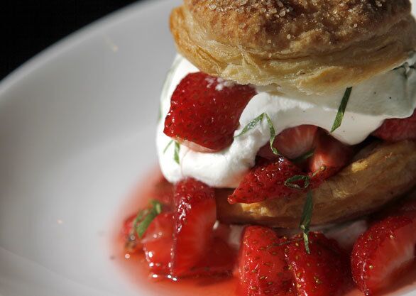 Strawberry-verbena shortcake with whipped vanilla cream.