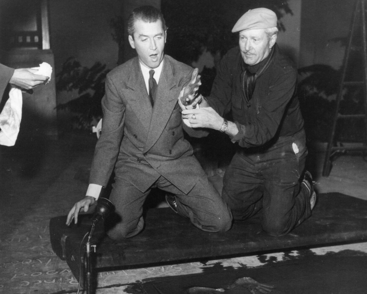 Jimmy Stewart at his handprint ceremony at the Chinese Theatre. (hollywoodphotographs.com )