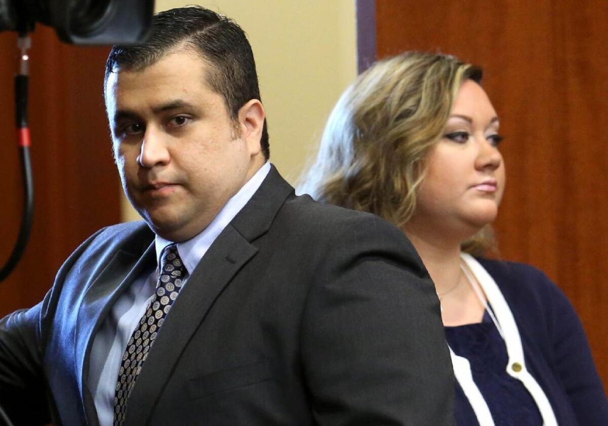 Shellie Zimmerman, who has filed for divorce from George Zimmerman, told NBC's "Today" show Thursday that she has doubts about her husband's innocence in the shooting of Trayvon Martin. Above, a file photo of the couple arriving in court in Sanford, Fla.
