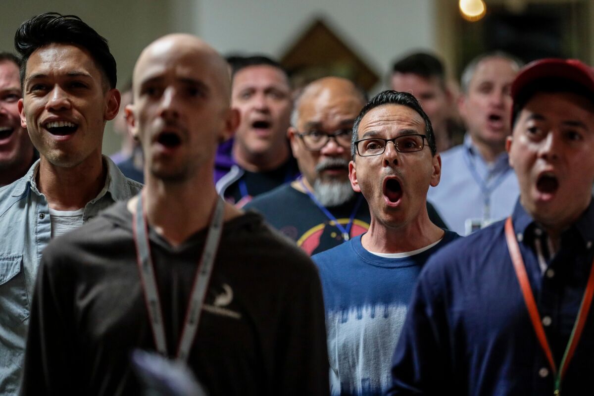 Santo Ragno, second from right, and the "tenor one" section rehearses with the rest of the Gay Men's Chorus of Los Angeles at the First Congregational Church.