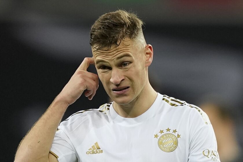 Bayern's Joshua Kimmich reacts as he walks off the field after their loss in the German Bundesliga soccer match between Bayer Leverkusen and Bayern Munich in Leverkusen, Germany, Sunday, March 19, 2023. (AP Photo/Martin Meissner)