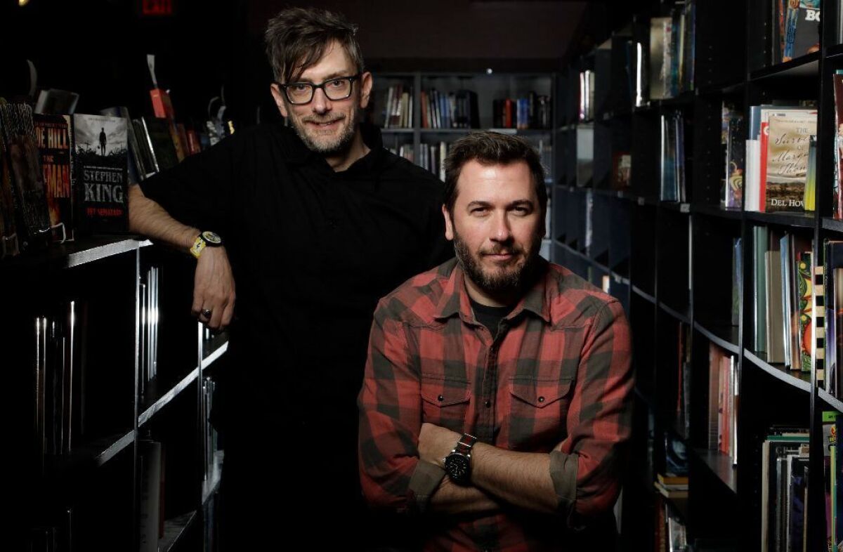 "Pet Sematary" co-directors Kevin Kölsch, left, and Dennis Widmyer make the leap from indie horror to the Stephen King reboot with a twist on the literary horror tale about grief, guilt, parenthood and trauma. They were photographed at Burbank's Dark Delicacies bookstore.