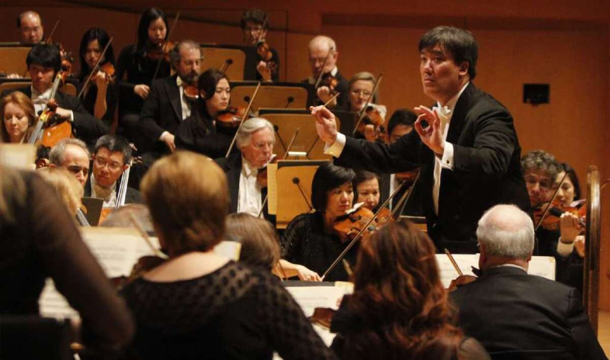 Alan Gilbert leading the New York Philharmonic at a concert at Walt Disney Concert Hall in May.
