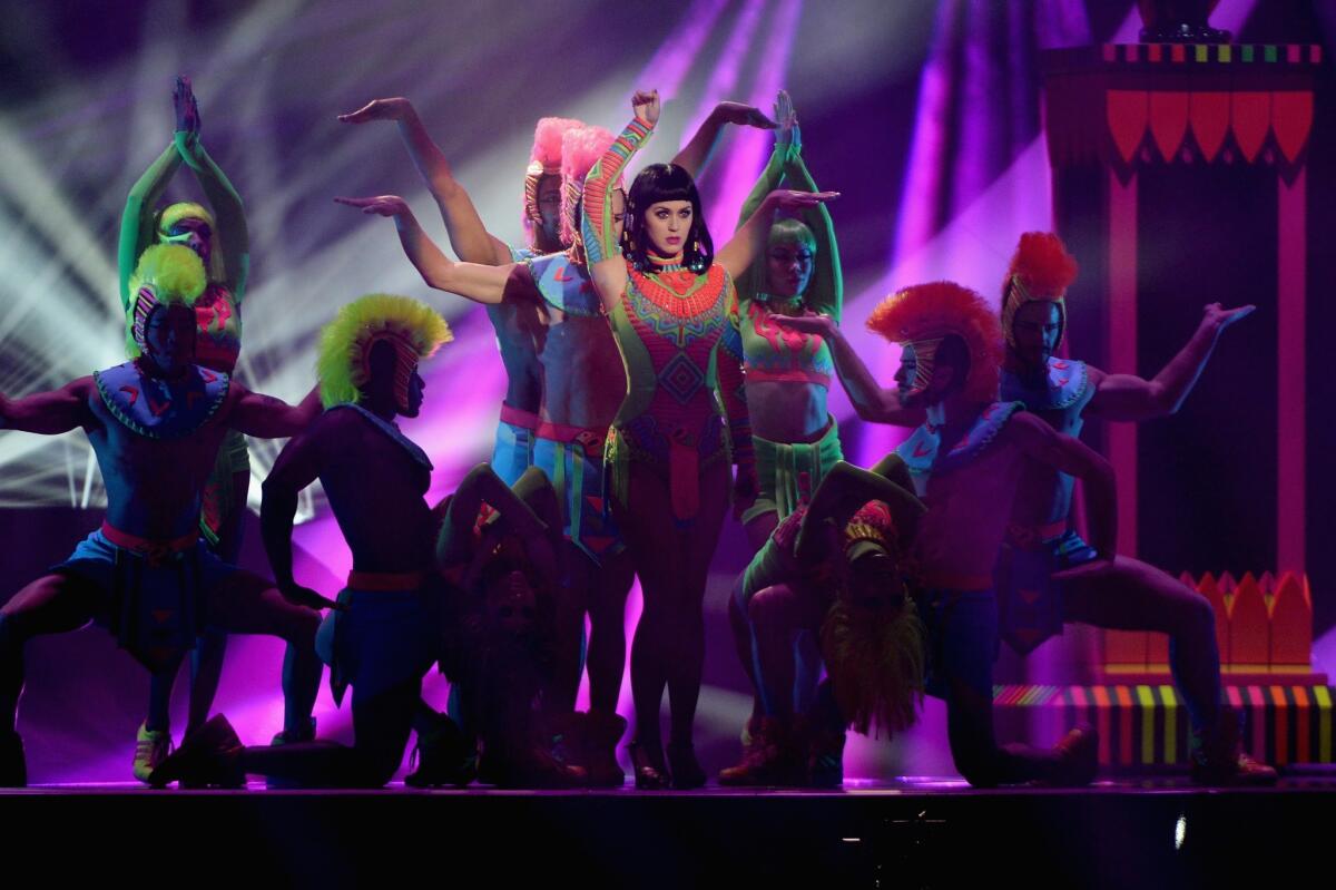Singer Katy Perry, shown performing in London for the BRIT Awards on Feb. 19, 2014, has been criticized for an image in her "Dark Horse" video in which a man wearing a pendant with the Arabic word for "God" is disintegrated. The video has been reedited to remove the image.