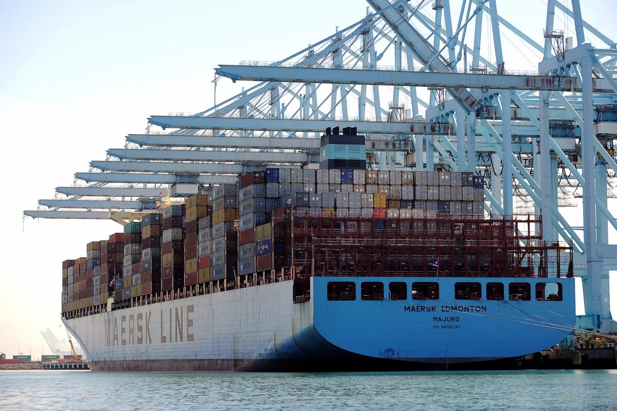 Maersk said it would introduce automated cargo carriers made in Poland to its giant APM Terminals at the Port of Los Angeles. Above, cargo is unloaded from a Maersk ship at the terminal.