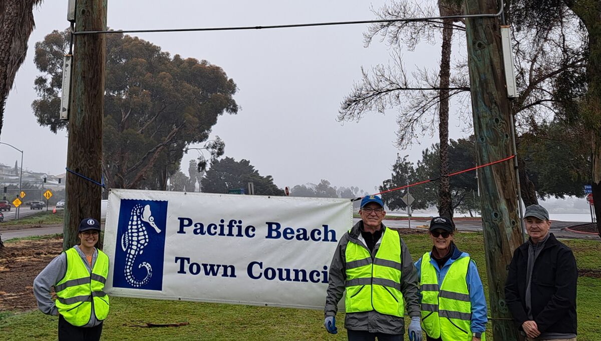 Pacific Beach Town Council members at the Mission Bay Drive on-ramp for their monthly “Second Saturday Cleanup” event.