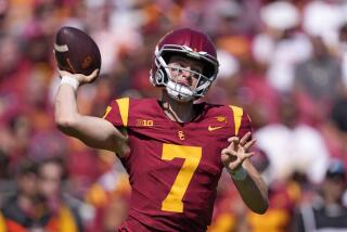 Southern California quarterback Miller Moss passes during the first half of an NCAA.