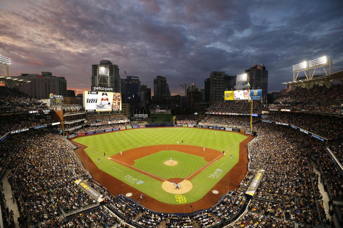 Sun sets on Petco Park as the Padres play the Rockies on Wednesday at Petco Park.