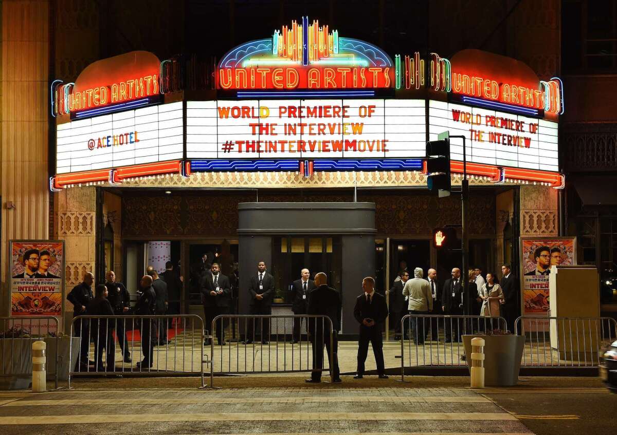 Security personnel stand outside The Theatre at the Ace Hotel before the premiere of "The Interview" in Los Angeles on Dec. 11.